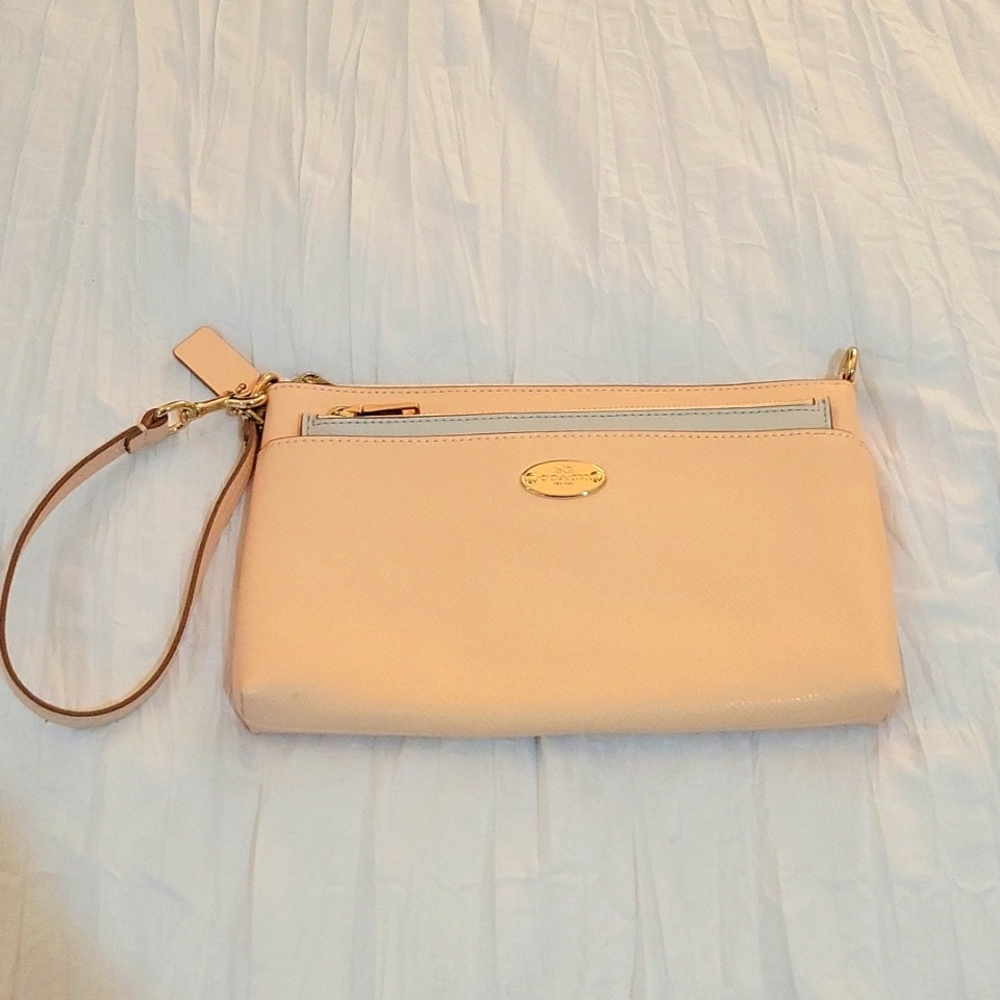 SOFT LEATHER COACH CLUTCH WITH ACCESSORY POCKET IN FRONT